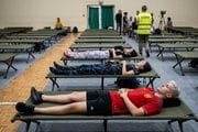 La jornada de ayer cerró con más de 60.000 las personas confinadas o evacuadas por los incendios declarados en la Comunidad de Madrid y la provincia de Ávila