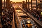 Imagen de archivo de pasajeros en un andén de la estación de trenes de Puerta de Atocha
